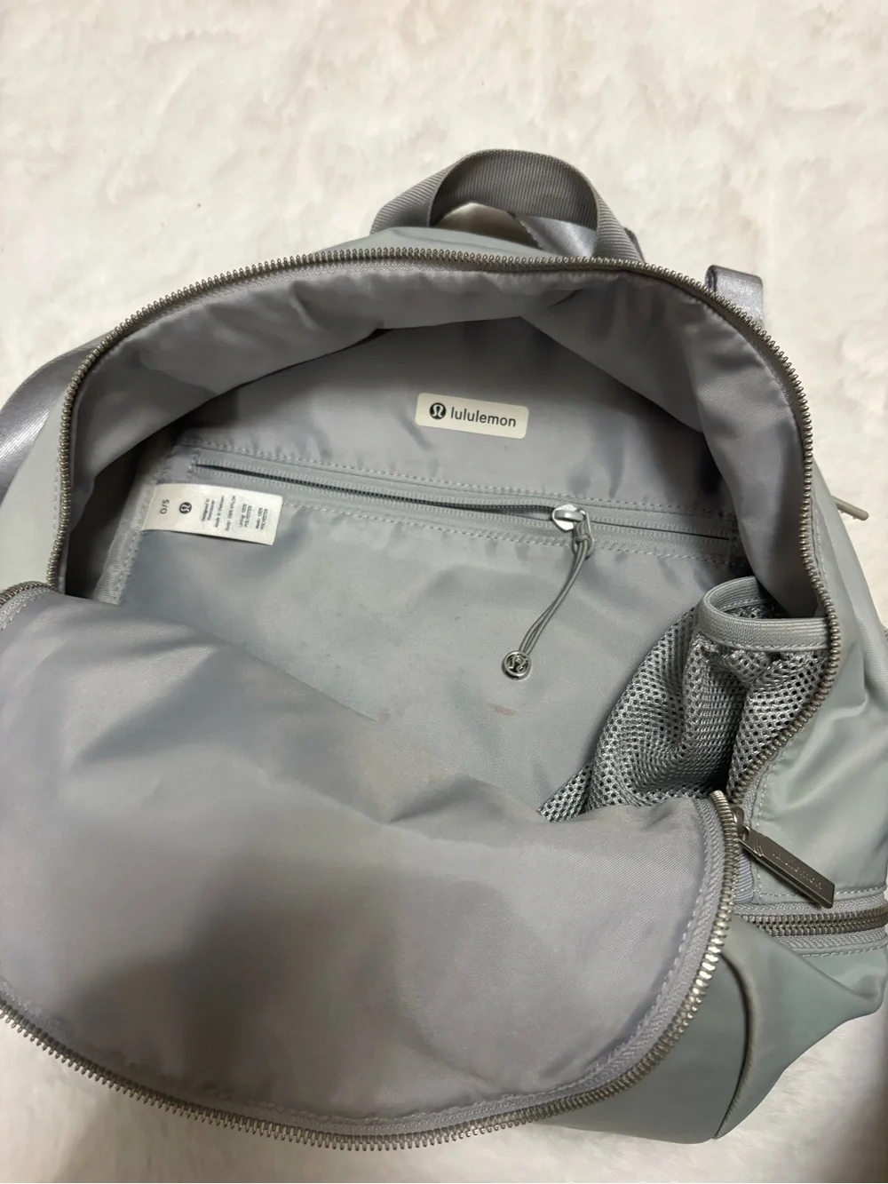 lululemon athletica Light Gray Men’s Backpack with Silver Accents